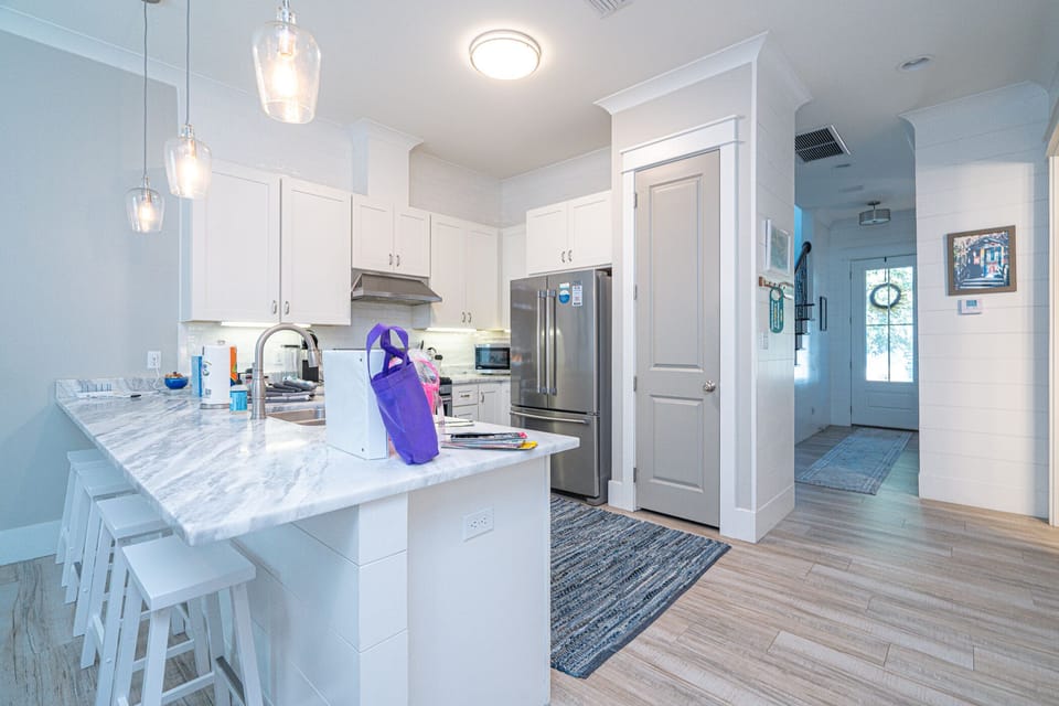 Open floor plan, dining, kitchen and living room, fully stocked
