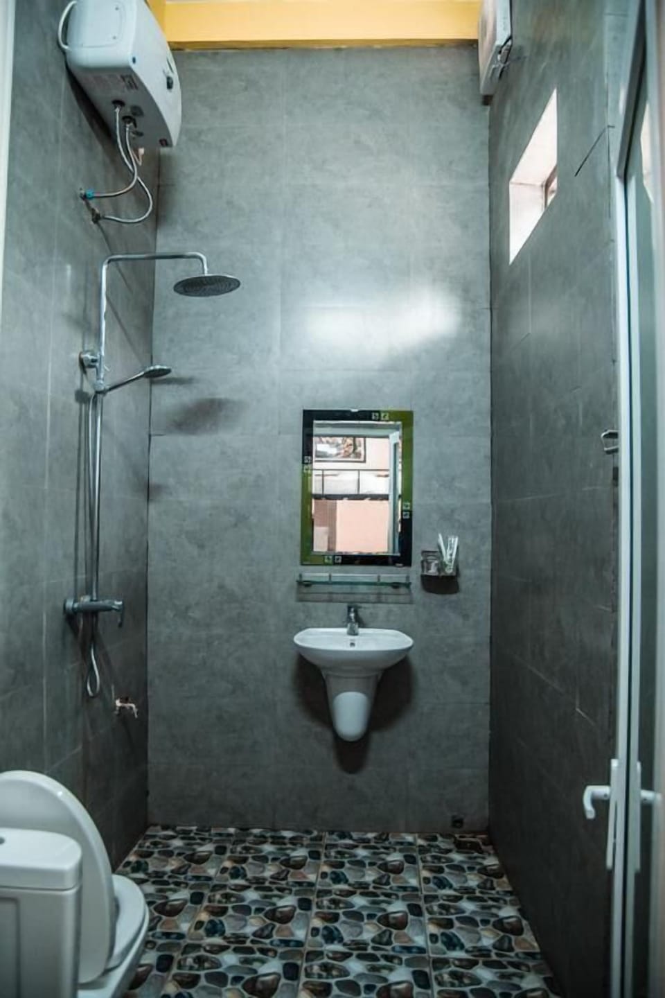 Shower, free toiletries, hair dryer, slippers