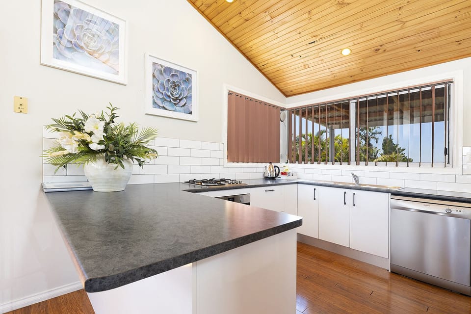 The kitchen has both garden views and towards Cape Hawke 