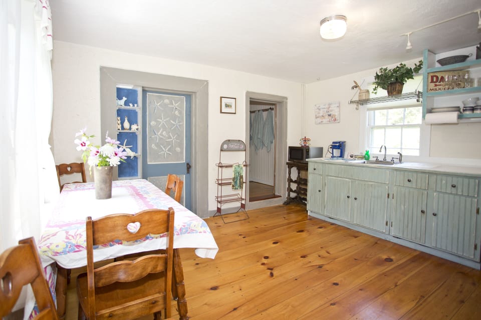 Bright sunny eat in kitchen.