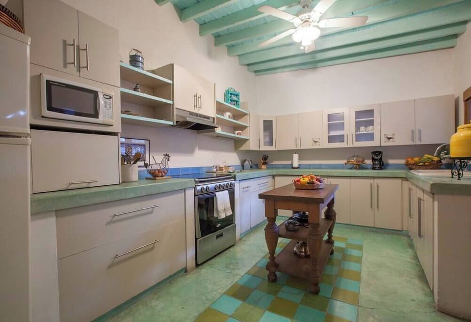 The kitchen is fully-equipped with dishes, silverware, pots and pans, and appliances. We also provide some cooking basics such as olive oil, vinegar, salt, and pepper.