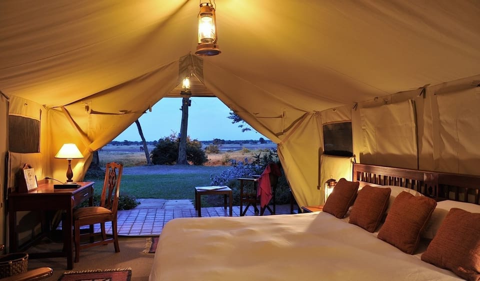Standard Tent, 1 King Bed, Park View | Desk, laptop workspace, WiFi (free), bed sheets