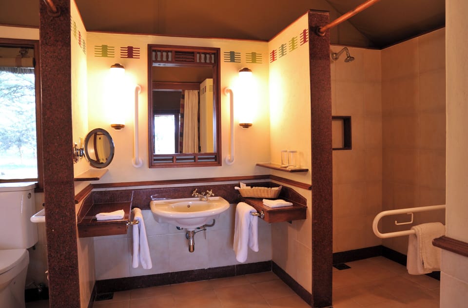 Deluxe Tent, 1 King Bed, Mountain View | Bathroom | Shower, designer toiletries, hair dryer (on request), bathrobes