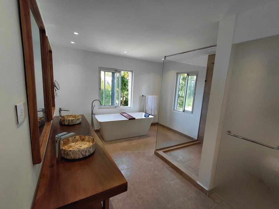Senior Chalet, Ocean View | Bathroom | Designer toiletries, hair dryer, bathrobes, slippers