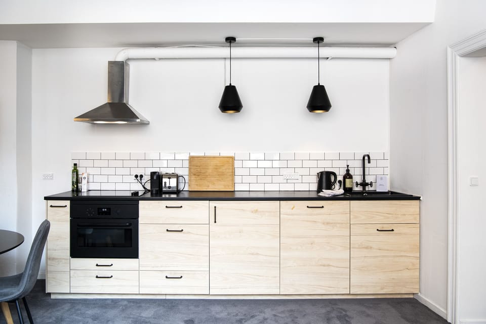 Design Apartment | Private kitchen | Full-size fridge, microwave, oven, stovetop