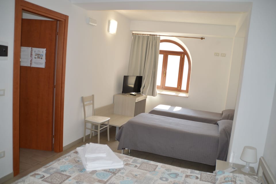 Superior Quadruple Room (Balata) | Premium bedding, desk, blackout drapes, free WiFi