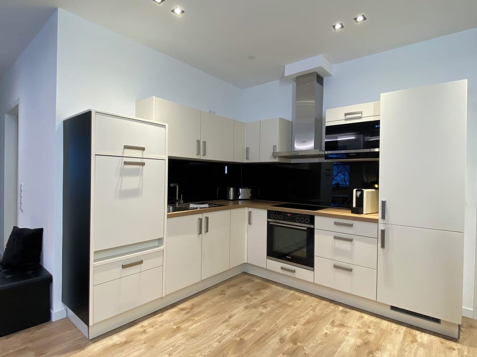 Premium Apartment, 2 Bedrooms | Private kitchen | Coffee/tea maker, electric kettle, toaster, mixer