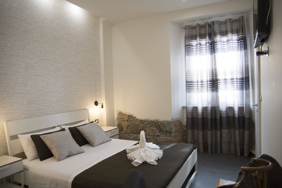 Double Room, Private Bathroom | Minibar, desk, blackout drapes, soundproofing