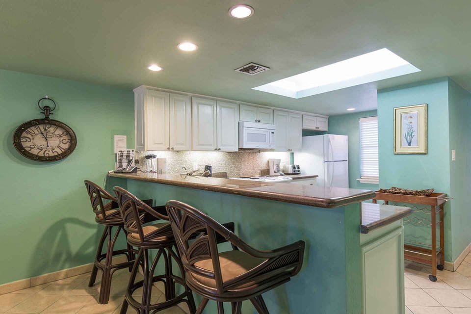 The kitchen is fully equipped with everything you might need for cooking.