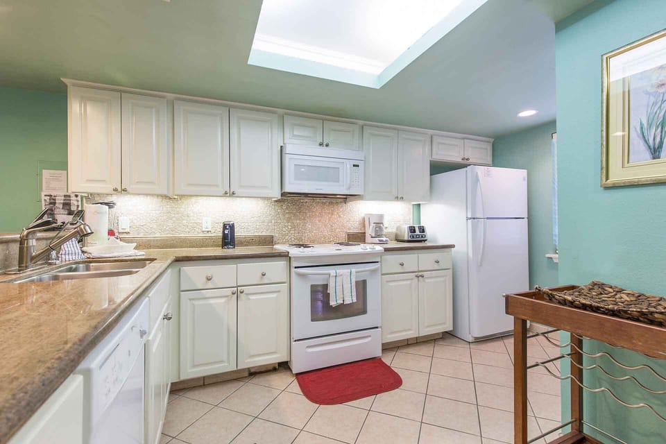 The granite countertops add great style and are easy to work on.