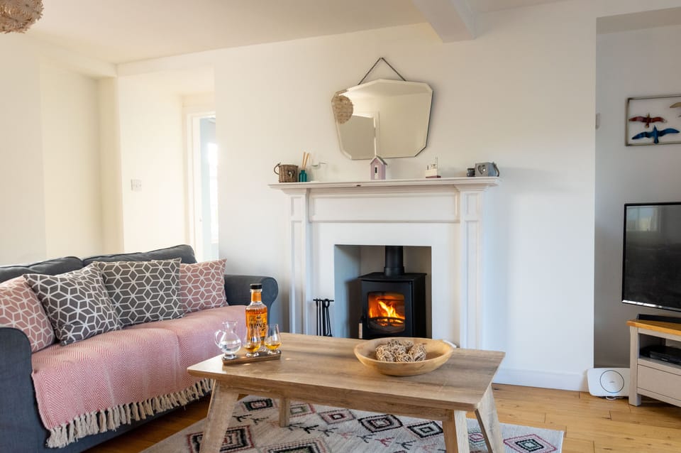 Living room with wood burning stove.