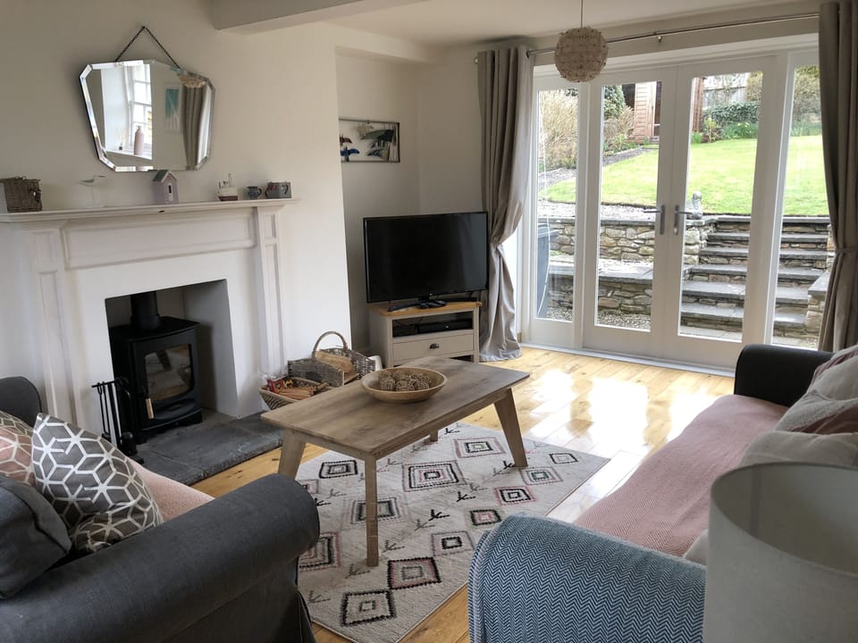 Sitting room with French doors to garden.