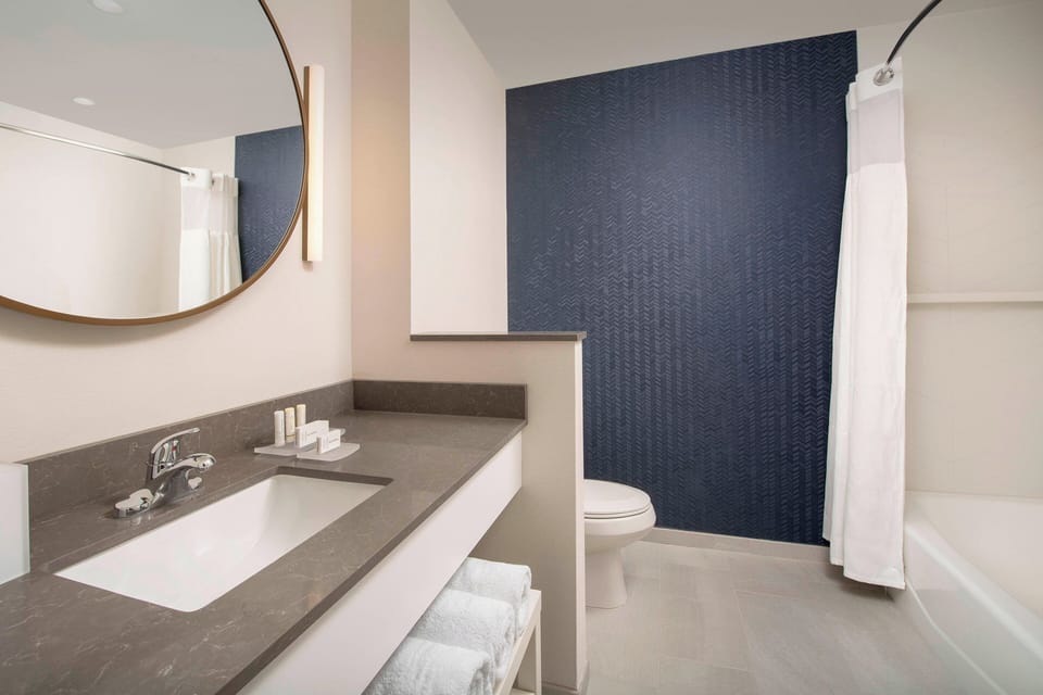 Shower, free toiletries, hair dryer, towels