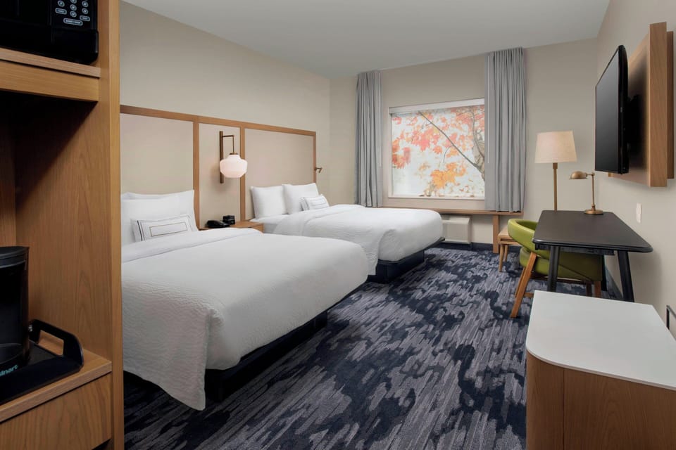 Desk, blackout drapes, soundproofing, iron/ironing board