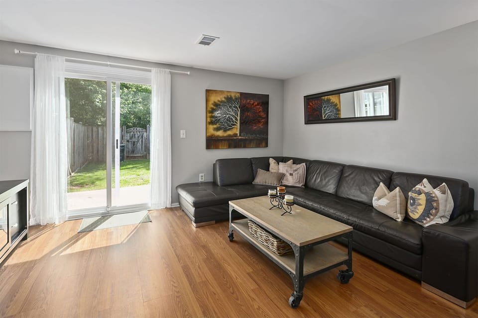 Spacious sectional sofa renders the ideal gathering space