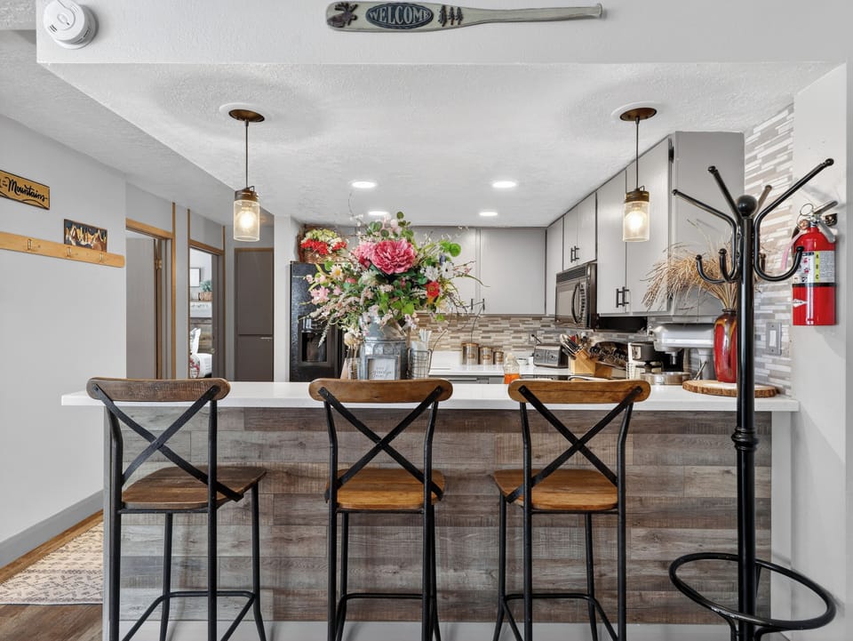 Gather around this beautifully appointed kitchen island where your group can share meals and create lasting memories together.