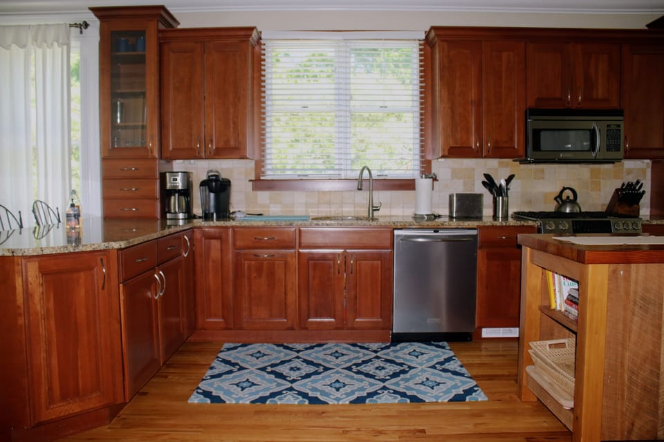 New SS appliances and custom island-well stocked kitchen has it all!