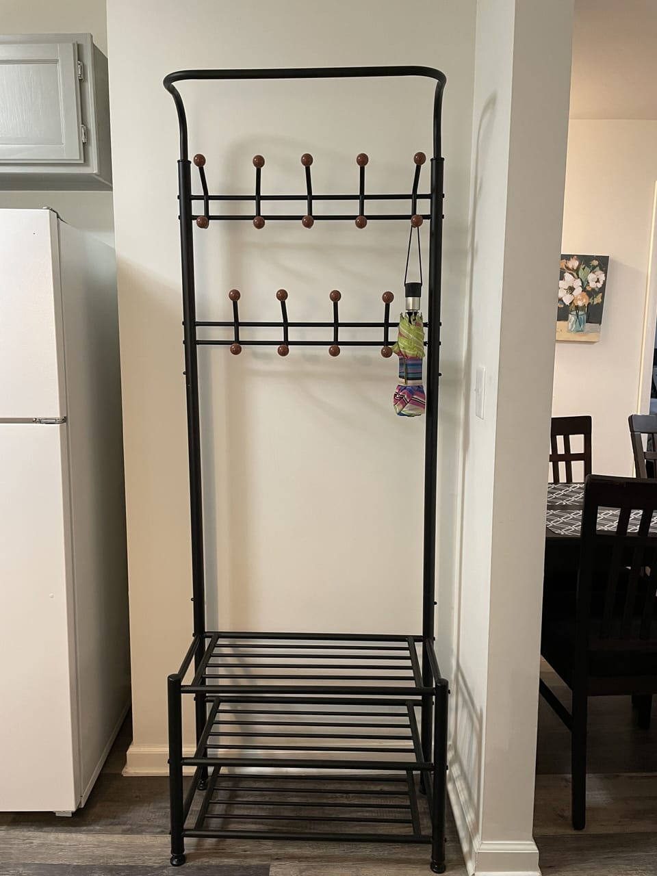 A coat rack is located in the entryway.