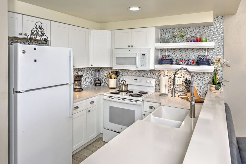 A full kitchen ready for real vacation cooking -Guests love how well stocked this kitchen is