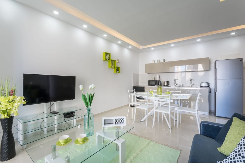Apartment, 2 Bedrooms, Non Smoking, Garden View | Living area | 42-inch flat-screen TV with satellite channels, TV