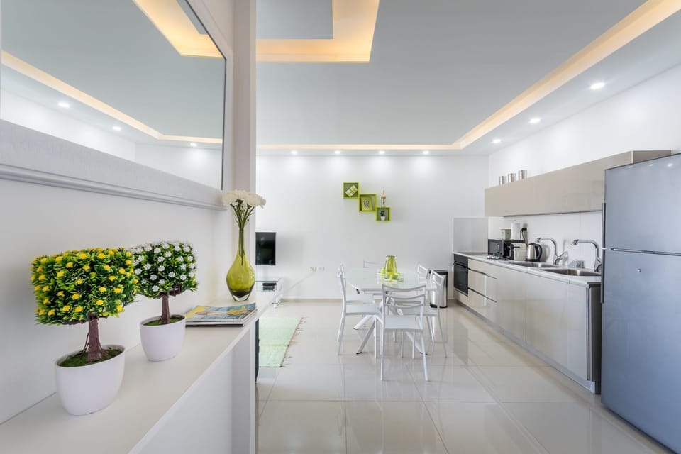 Apartment, 2 Bedrooms, Non Smoking, Garden View | Private kitchen | Full-size fridge, microwave, oven, stovetop