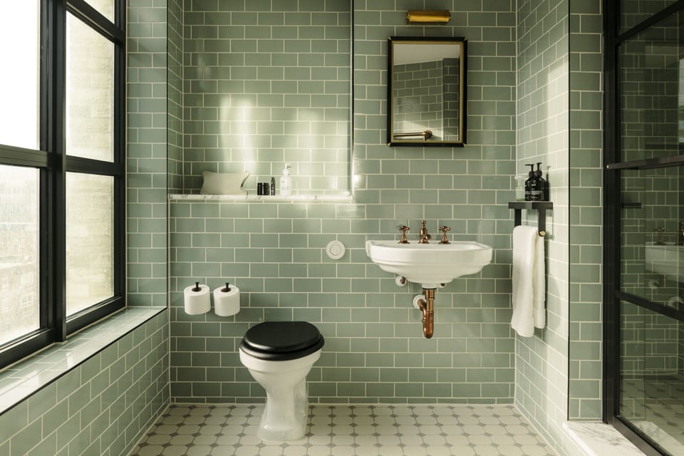 Shower, rainfall showerhead, designer toiletries, hair dryer