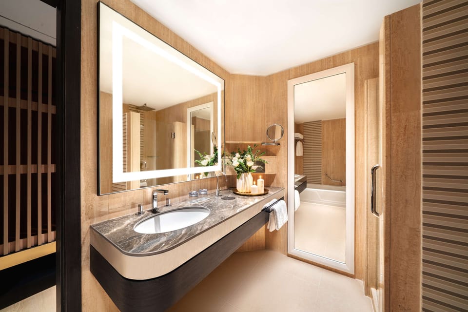 Separate tub and shower, eco-friendly toiletries, hair dryer, bathrobes