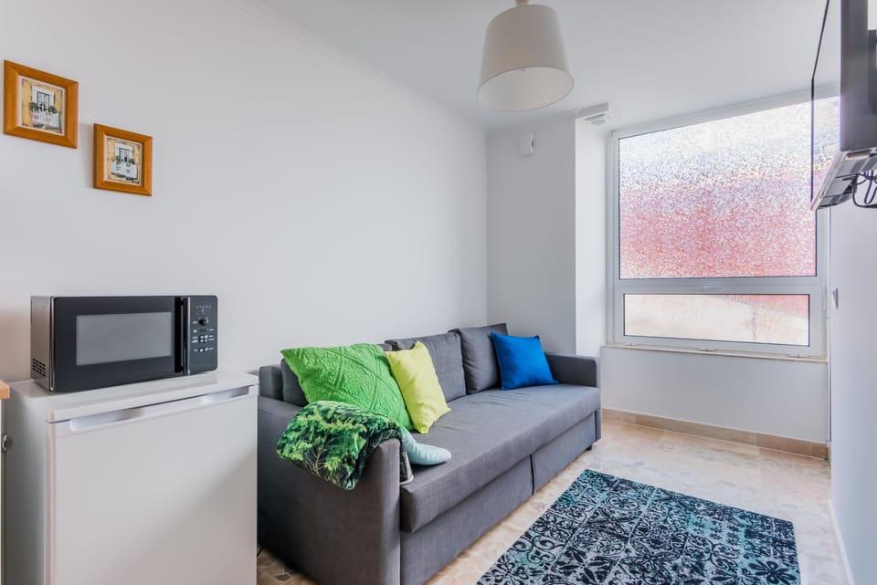 Apartment, Ground Floor | Living area | Flat-screen TV