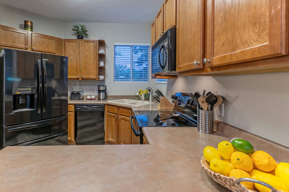 This kitchen provides the space you need to prepare and serve a feast.