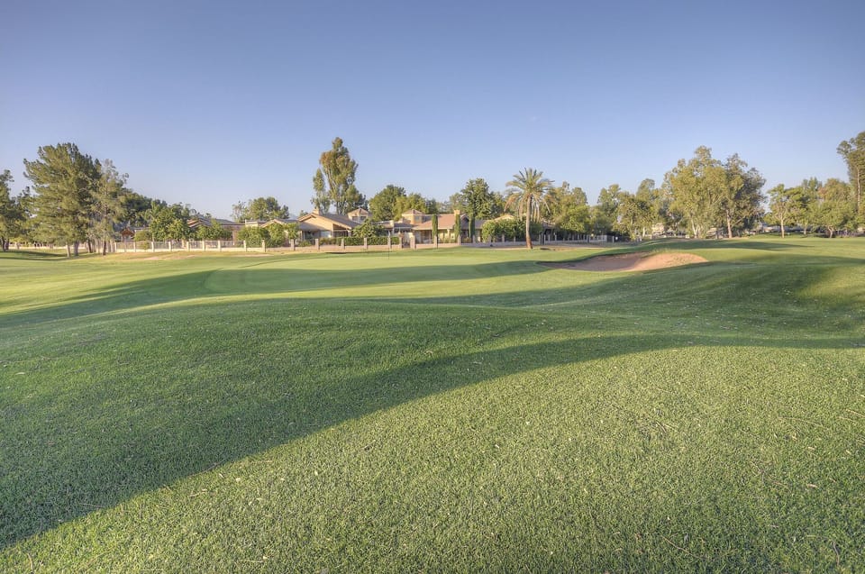 Home's patio has an exciting view of the Starfire Golf Club, a popular daily fee public course with 27 holes.