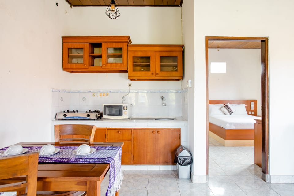 Room, 1 Bedroom, Non Smoking, Pool View | Private kitchen | Fridge, microwave, stovetop, coffee/tea maker