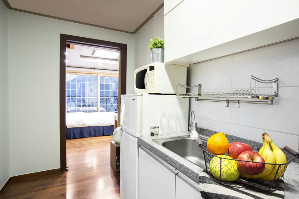 Full-size fridge, microwave, stovetop, electric kettle
