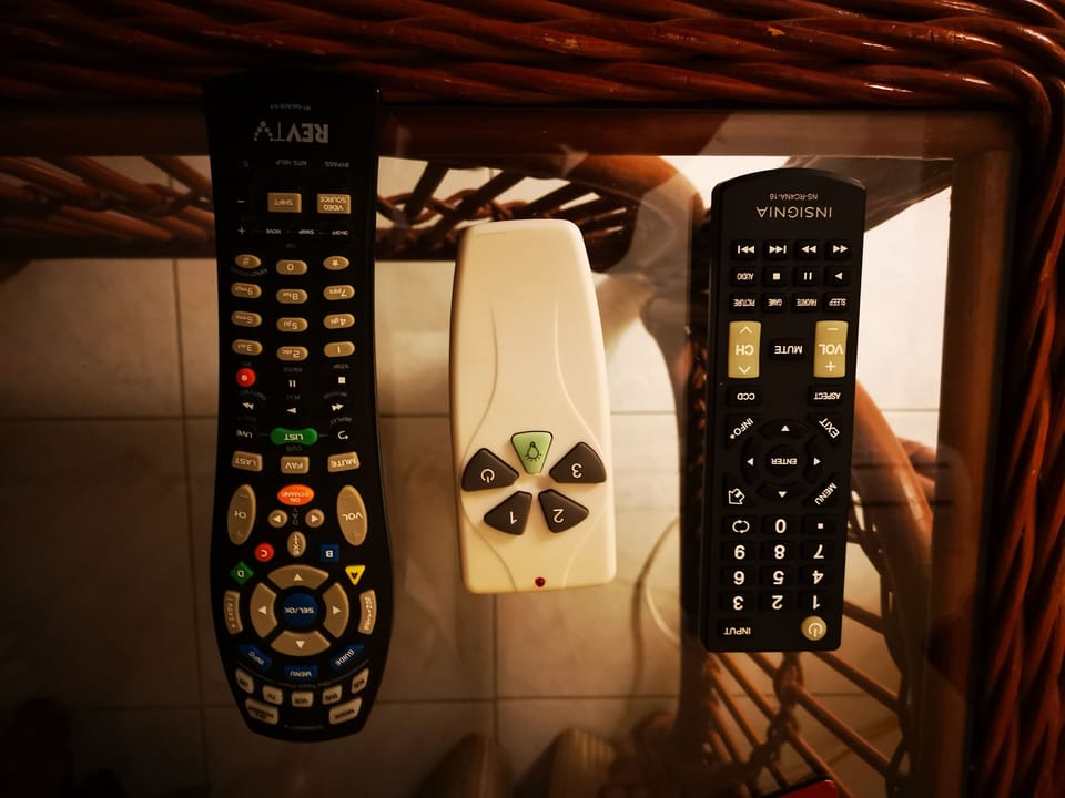 TV,cable and fan remotes, A/C  remote is on the wall under the A/C unit