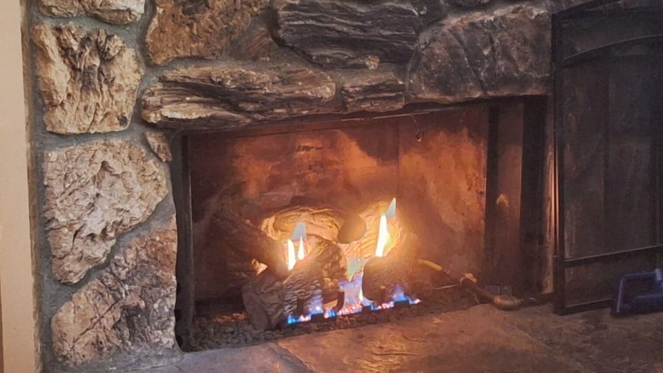 Gas burning fireplace with remote control
