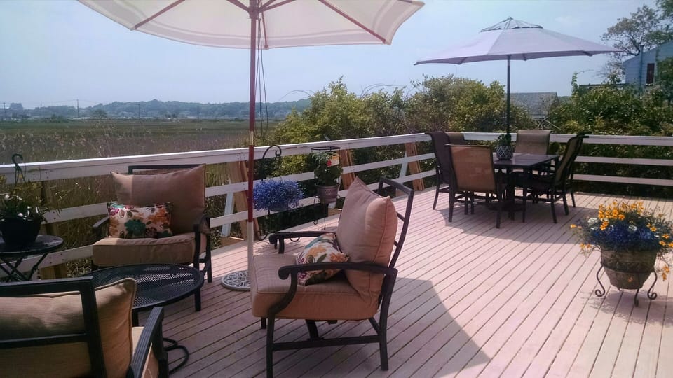 Summer view of deck.  Recently upgraded seating.