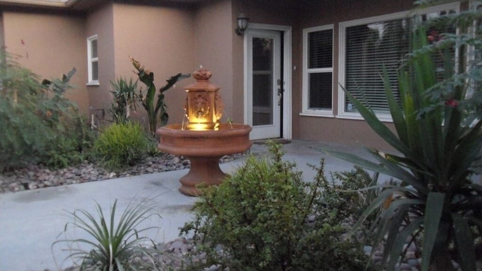 fountain and garden welcome you to our home