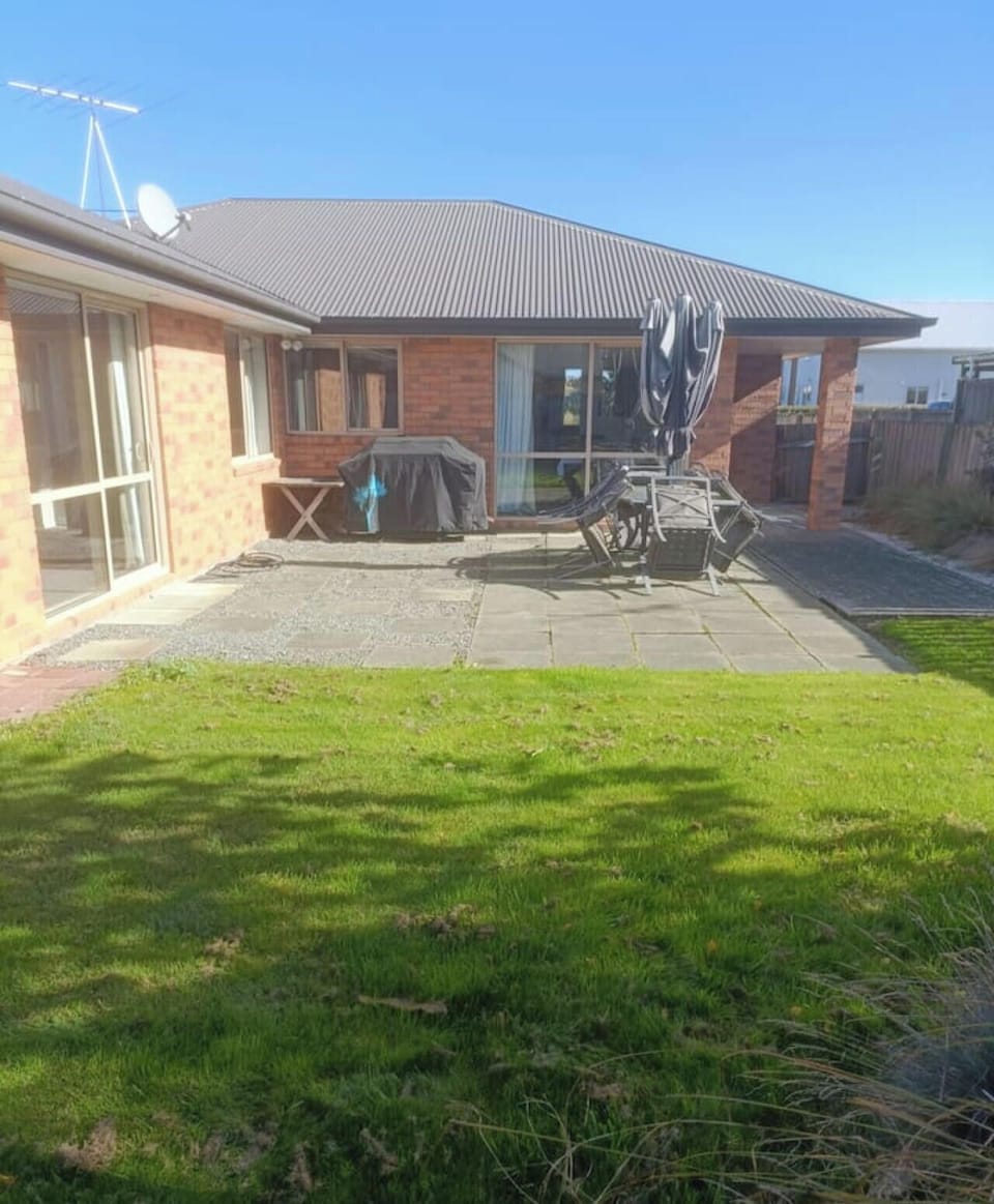 Private, fenced rear yard.