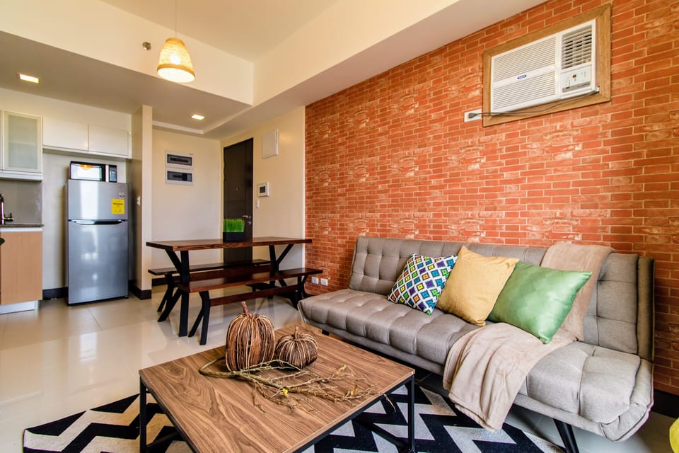 Exclusive Condo, 1 Queen Bed with Sofa bed, Lake View | Living area | LED TV, Netflix