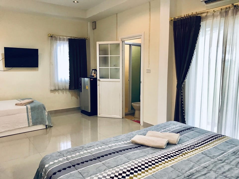 Triple Room  | Blackout drapes, free WiFi, bed sheets
