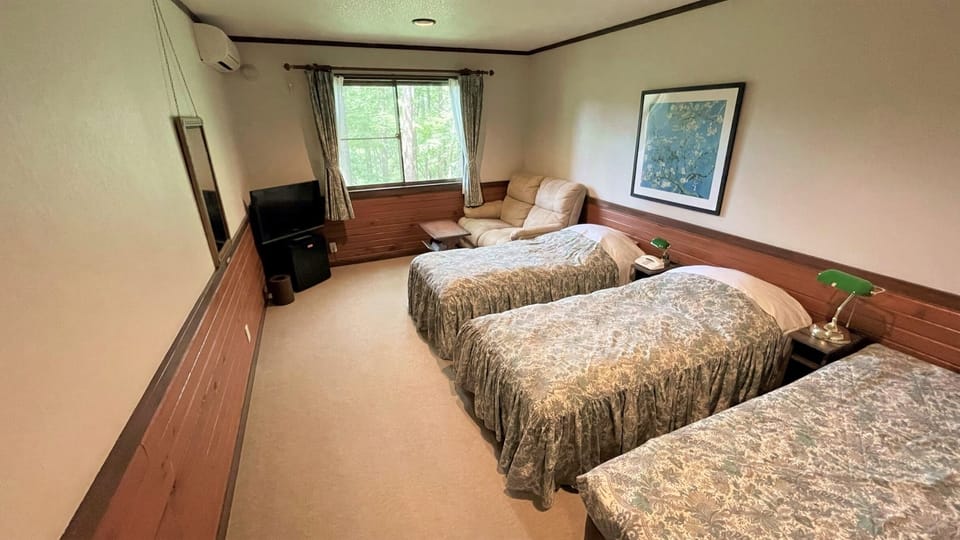 Family Triple Room | Blackout drapes, free WiFi, bed sheets