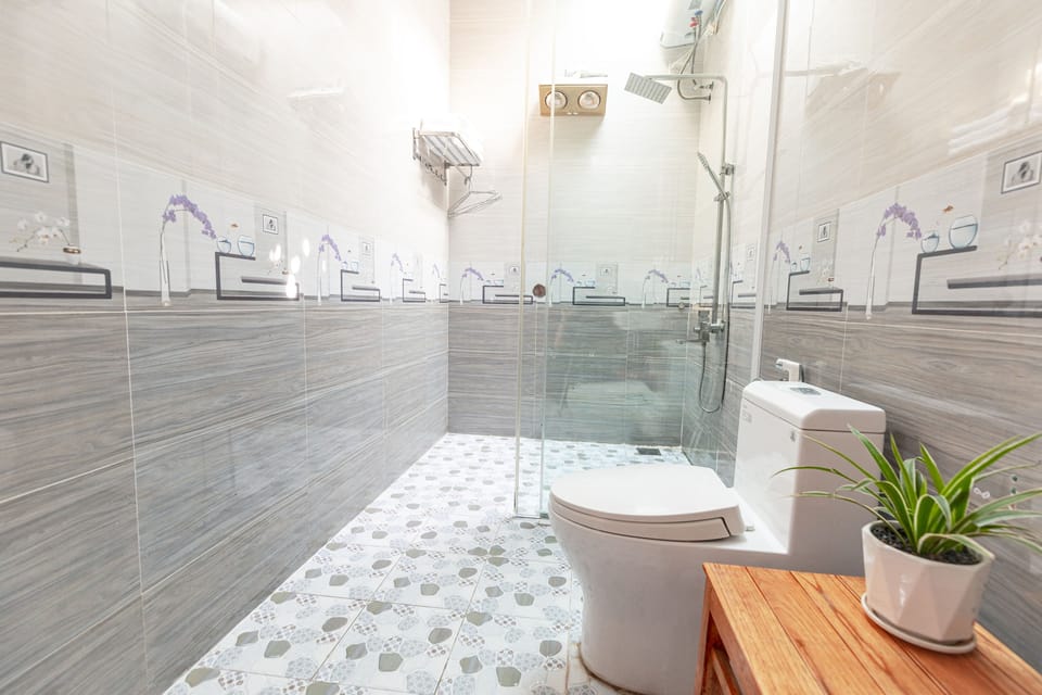 Shower, free toiletries, hair dryer, slippers