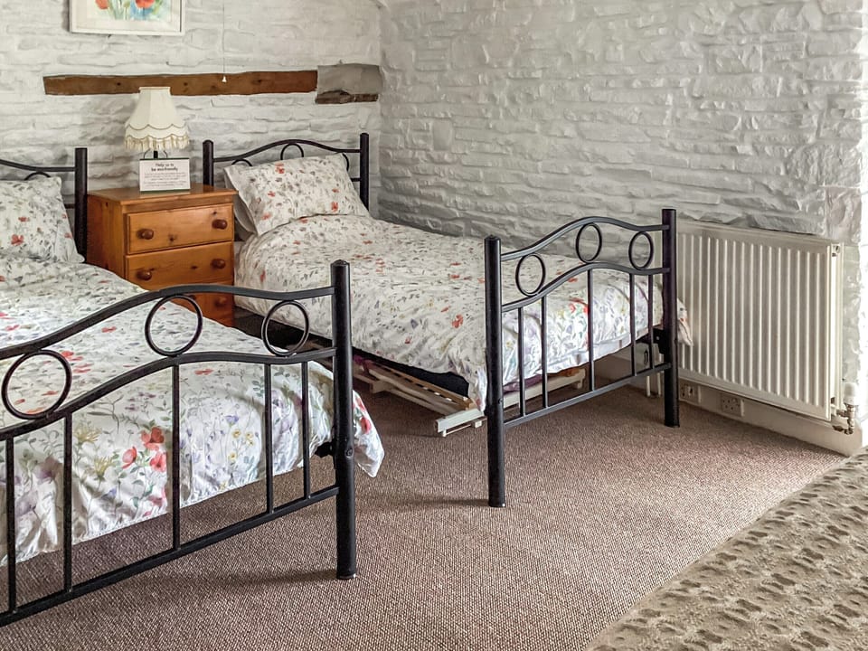 Twin bedroom with an additional single bed | The Haybarn, Devauden, near Chepstow
