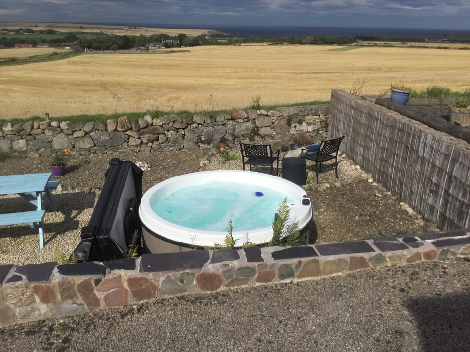 Hot tub with uninterrupted panoramic views towards the coast | The Brae Steading, Fordyce