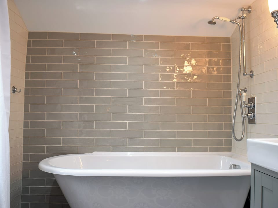 Tiled bathroom | Cosy Cottage, Portinscale, near Keswick