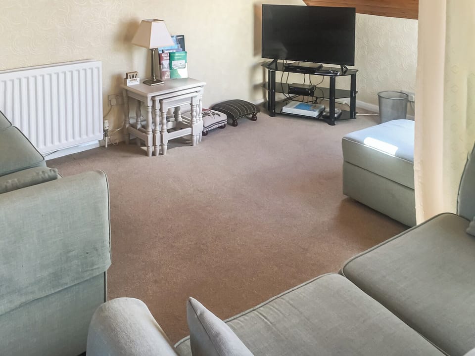 Comfy seating within living room | Harbour Cottage, Haverigg, near Millom
