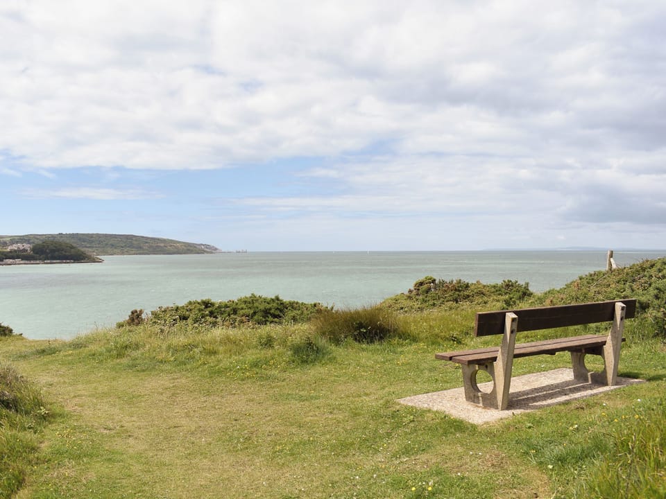Outdoor seating looking out to sea | Needles and Winds, Freshwater