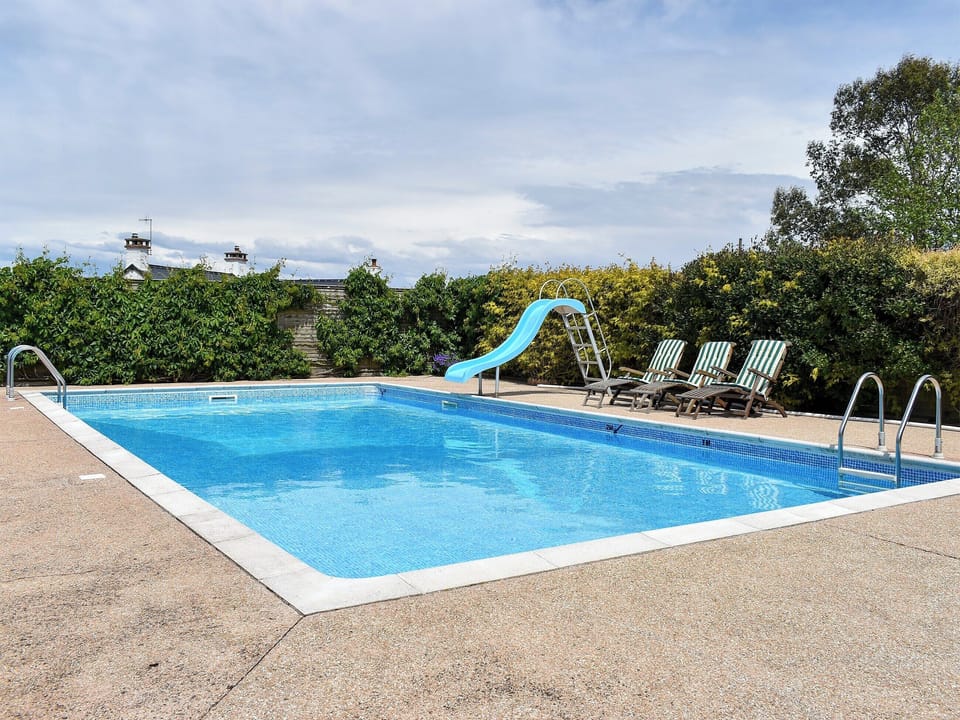 Heated outdoor swimming pool | Bournstream Cottage, Bilbrook, near Minehead