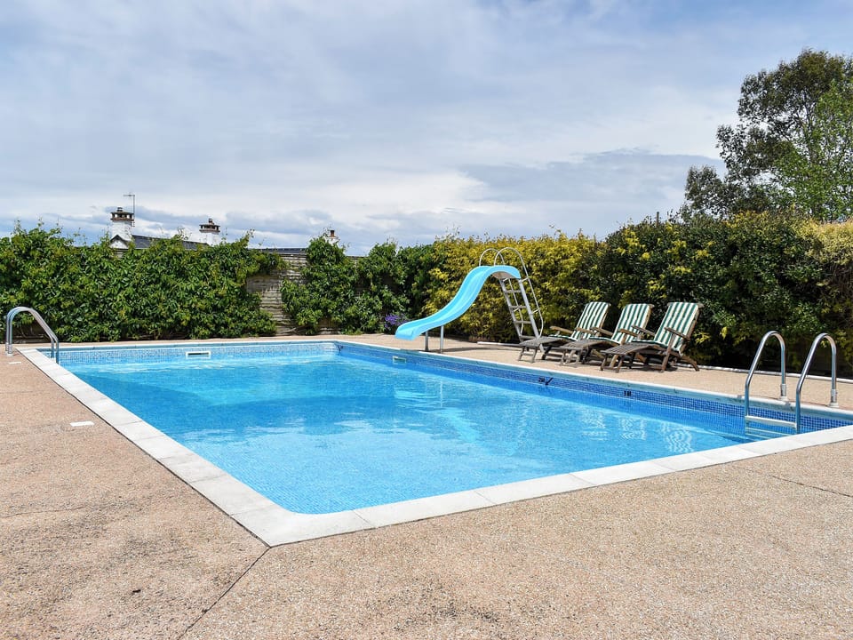 Heated outdoor swimming pool | Bournstream Cottage, Bilbrook, near Minehead