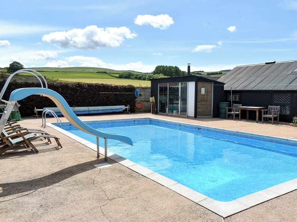 Heated outdoor swimming pool | Bournstream Cottage, Bilbrook, near Minehead