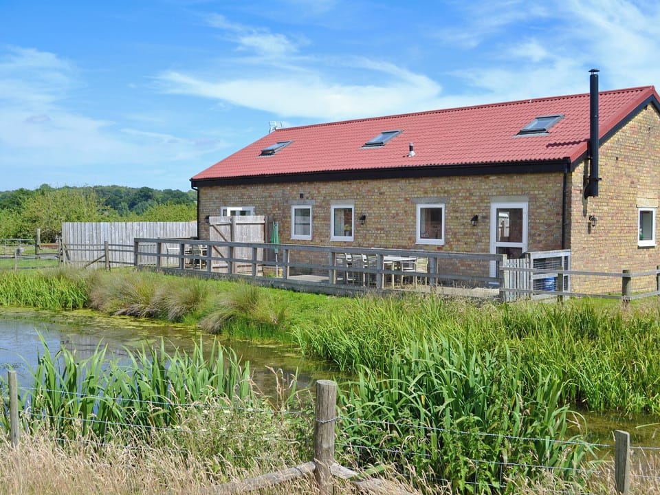 Charming semi detached properties located next to a pond | Romney Cottages, Peasmarsh, nr. Rye